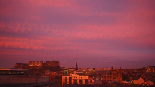 Cityscape against sky during sunset