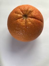 Directly above shot of orange slice on table