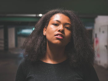 Portrait of a beautiful young woman looking away