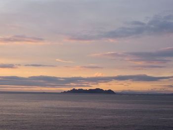 Scenic view of sea against sky at sunset