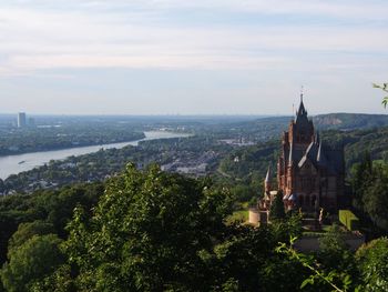 Panoramic view of buildings and city against sky