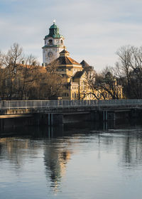 Bridge over river against sky