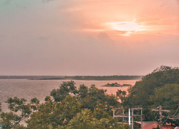 Scenic view of landscape against sky during sunset