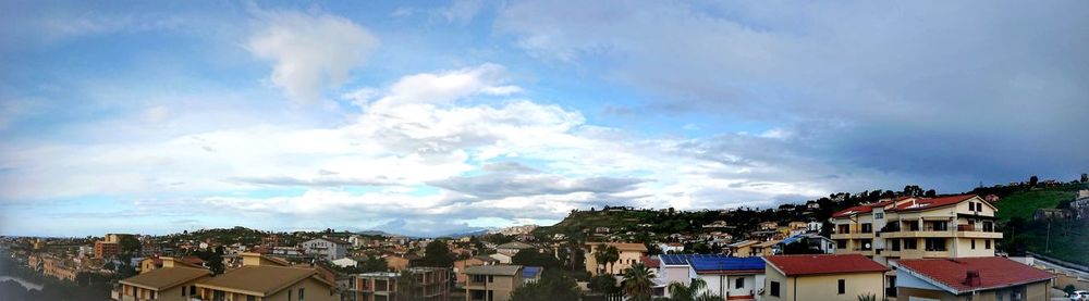 Panoramic shot of townscape against sky