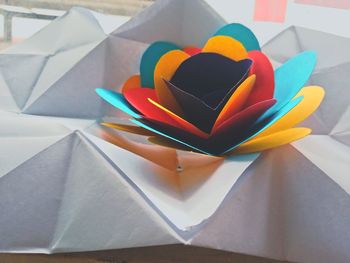 High angle view of multi colored paper on table