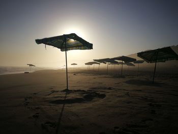 Scenic view of beach against clear sky