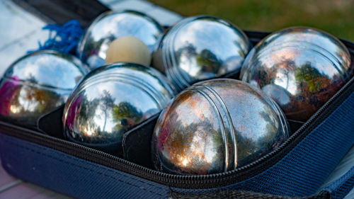 Close-up of metallic objects in container