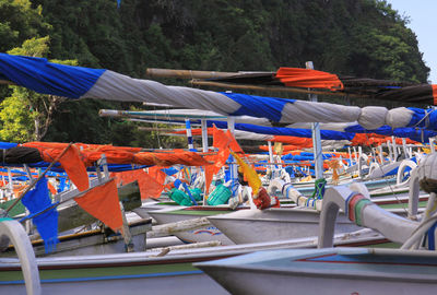 Multi colored umbrellas hanging on clothesline