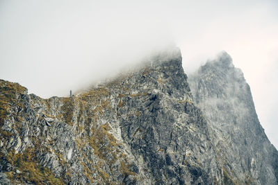 Scenic view of rocky mountains against sky