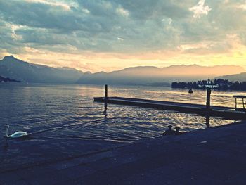 Scenic view of sea against cloudy sky