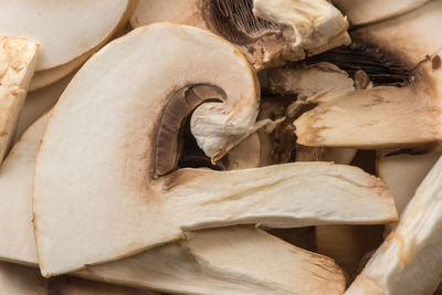 Close-up of sliced mushrooms, ingredients for pizza and roast.