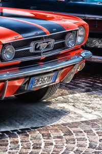 High angle view of red car on street