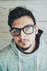 Portrait of young man wearing eyeglasses