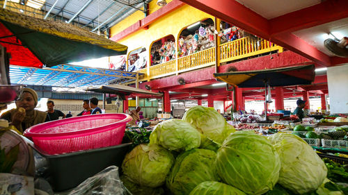 People at market stall