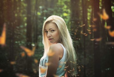 Portrait of a beautiful woman in the forest