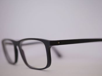 Close-up of eyeglasses against white background