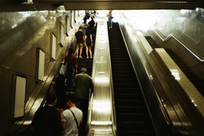 High angle view of people on escalator at subway station