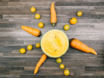 High angle view of orange fruits on table