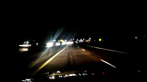 Light trails on road at night