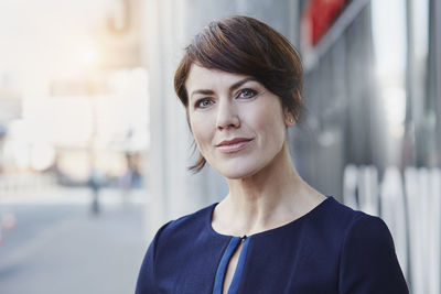 Portrait of confident businesswoman outdoors