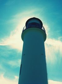 Low angle view of lighthouse against cloudy sky