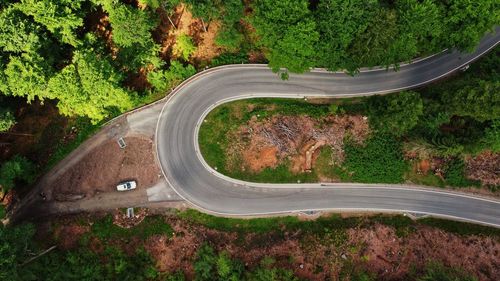 High angle view of road amidst trees