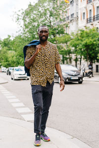 Full length of man standing on street