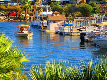 Boats moored in sea