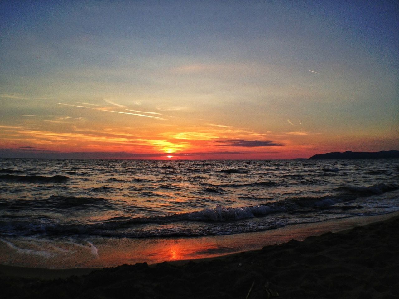 sunset, sea, water, scenics, horizon over water, beauty in nature, beach, tranquil scene, orange color, sky, tranquility, wave, shore, nature, idyllic, surf, sun, cloud - sky, remote, outdoors