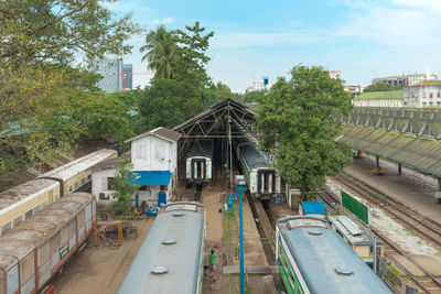 High angle view of buildings in city against sky