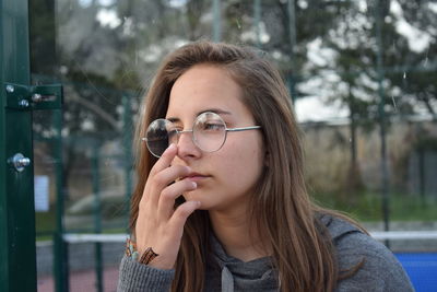 Portrait of woman wearing eyeglasses