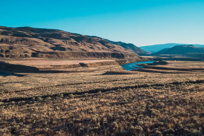 Scenic view of mountains against clear sky