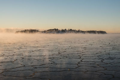 Scenic view of landscape against sky during sunset