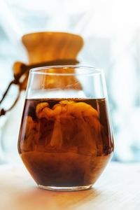 Close-up of tea in glass on table