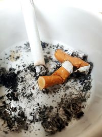 Close-up of cigarette smoking