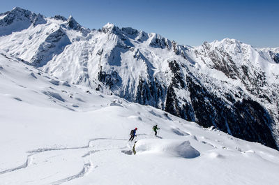 Scenic view of snow covered mountains