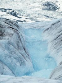 High angle view of melting glacier