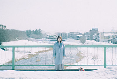 Man standing on snow against clear sky