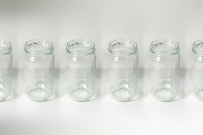 Close-up of glasses against white background