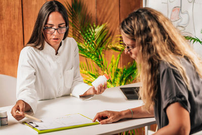 Woman working on table