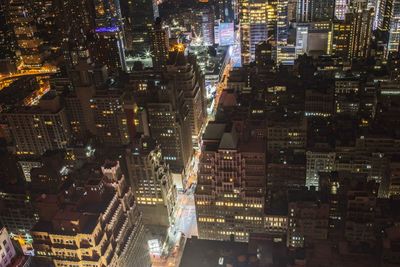 Aerial view of illuminated city at night