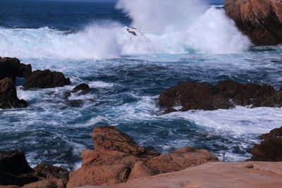 Scenic view of rocks and sea