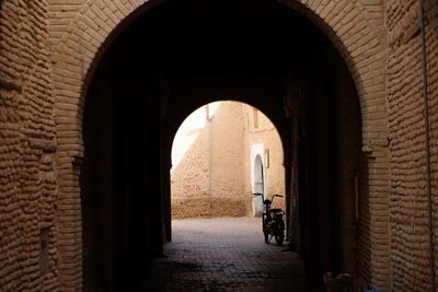 Cobblestone street amidst buildings