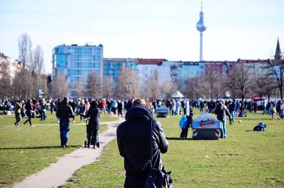 People at park against sky