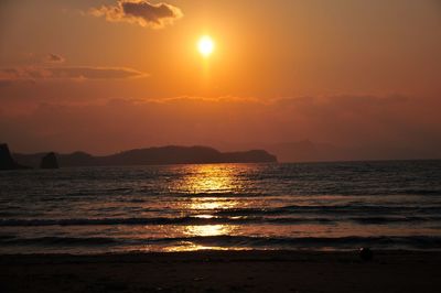 Scenic view of sunset over sea