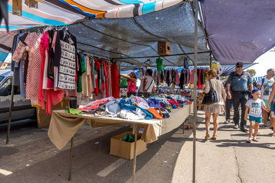 Clothes for sale at market stall