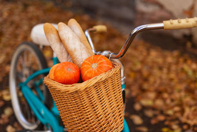 Close-up of orange pumpkins in basket