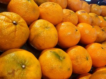 Full frame shot of oranges in market