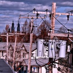 Low angle view of cables against sky