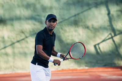 Man playing tennis